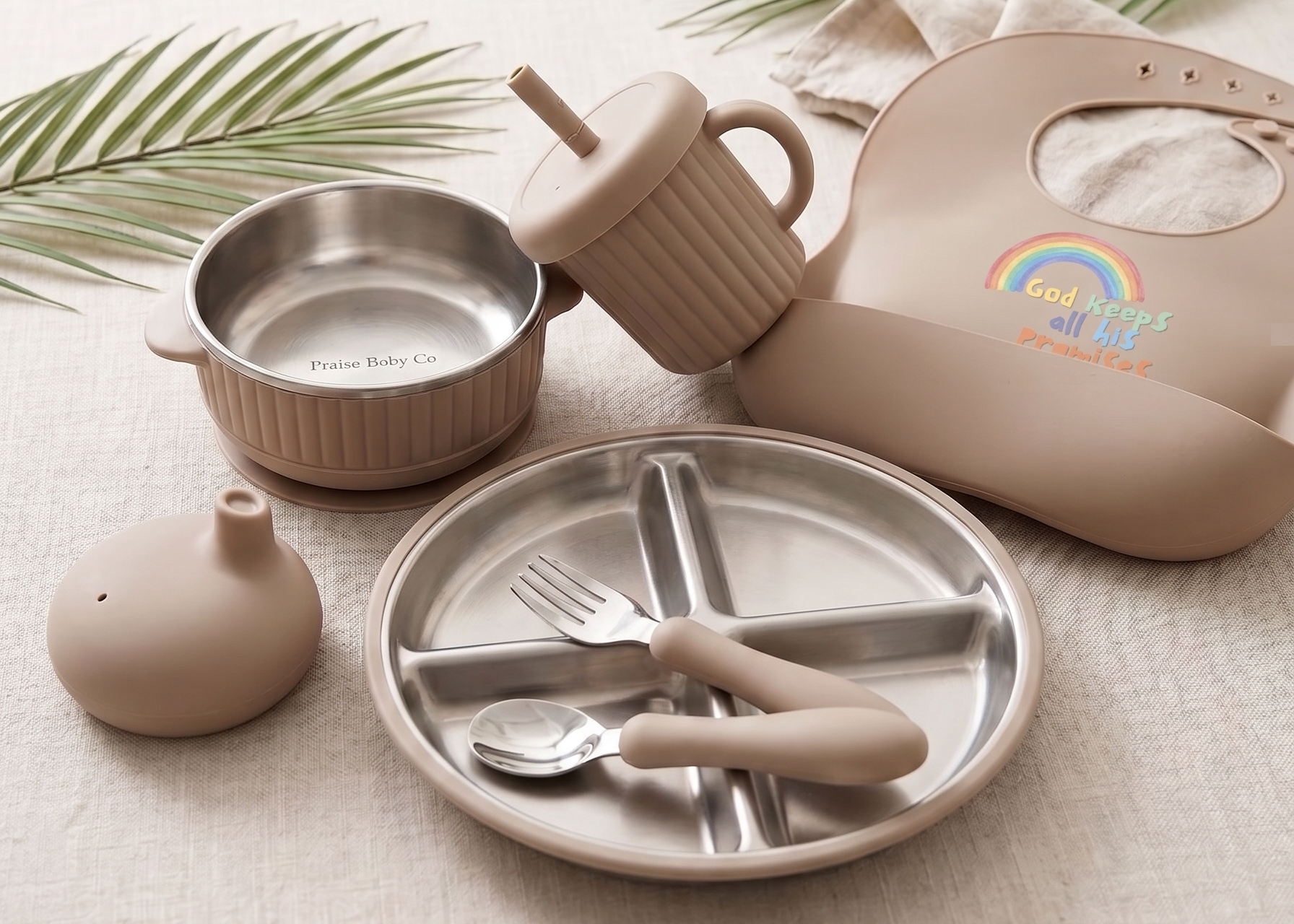 Children's silicone and stainless steel tableware set with rainbow on bib and God keeps on his promises. sand coloured
