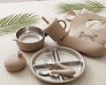 Children's tableware set including plate, cups, and cutlery on a neutral background with graphic on bib and Praise Baby Co logo.